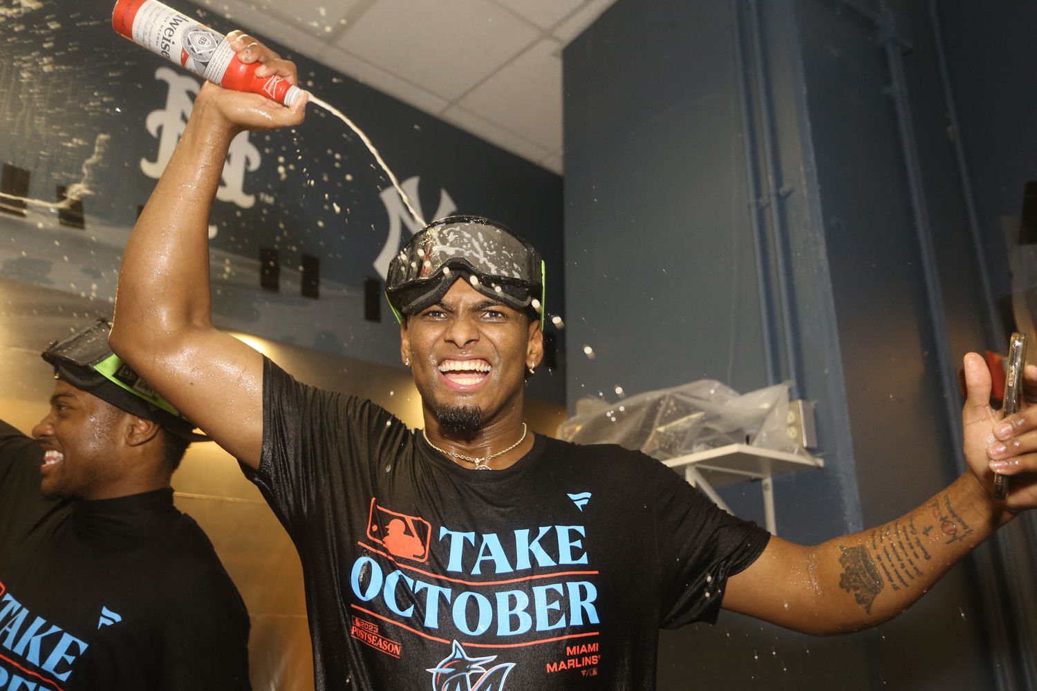 Sep 30, 2023; Pittsburgh, Pennsylvania, USA; Miami Marlins Jorge Soler celebrates in the locker room after defeating the Pittsburgh Pirates at PNC Park to secure a berth in the 2023 MLB playoffs. Miami won 7-4. Mandatory Credit: Charles LeClaire-USA TODAY Sports  